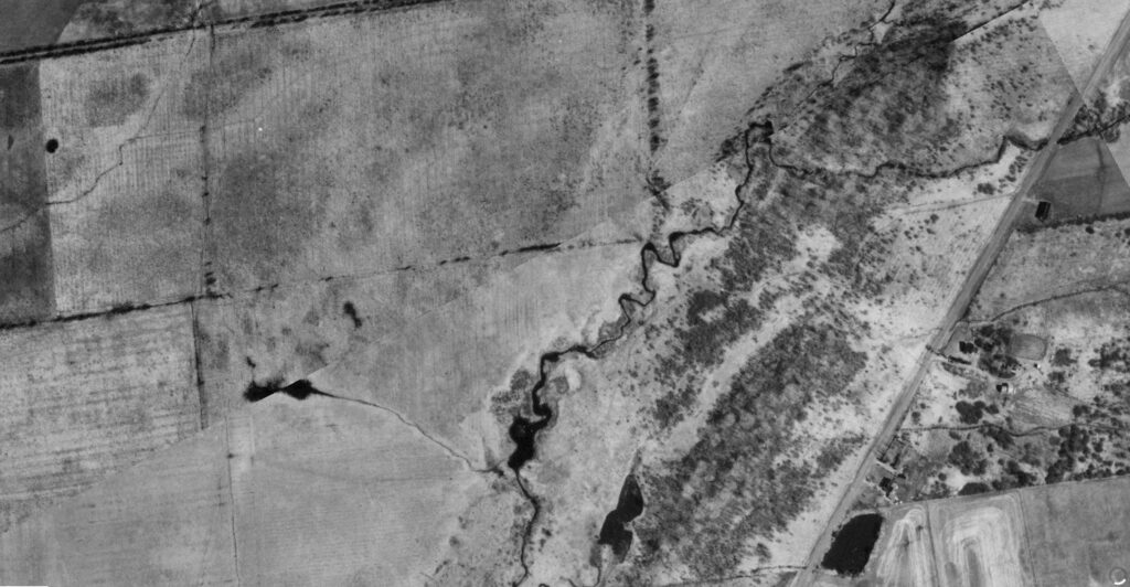 Kingston East site photographed in the 1980's showing farmland use